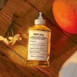 Maison Margiela | REPLICA' Chasing Sunsets Eau de Toilette with Mango and Sandalwood Travel Spray